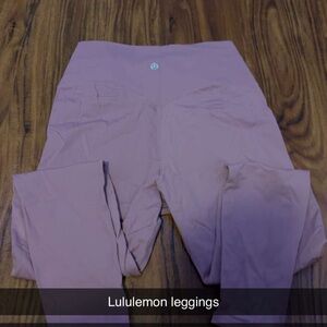 Lululemon leggings size 4 are a pink color worn once no problems with them